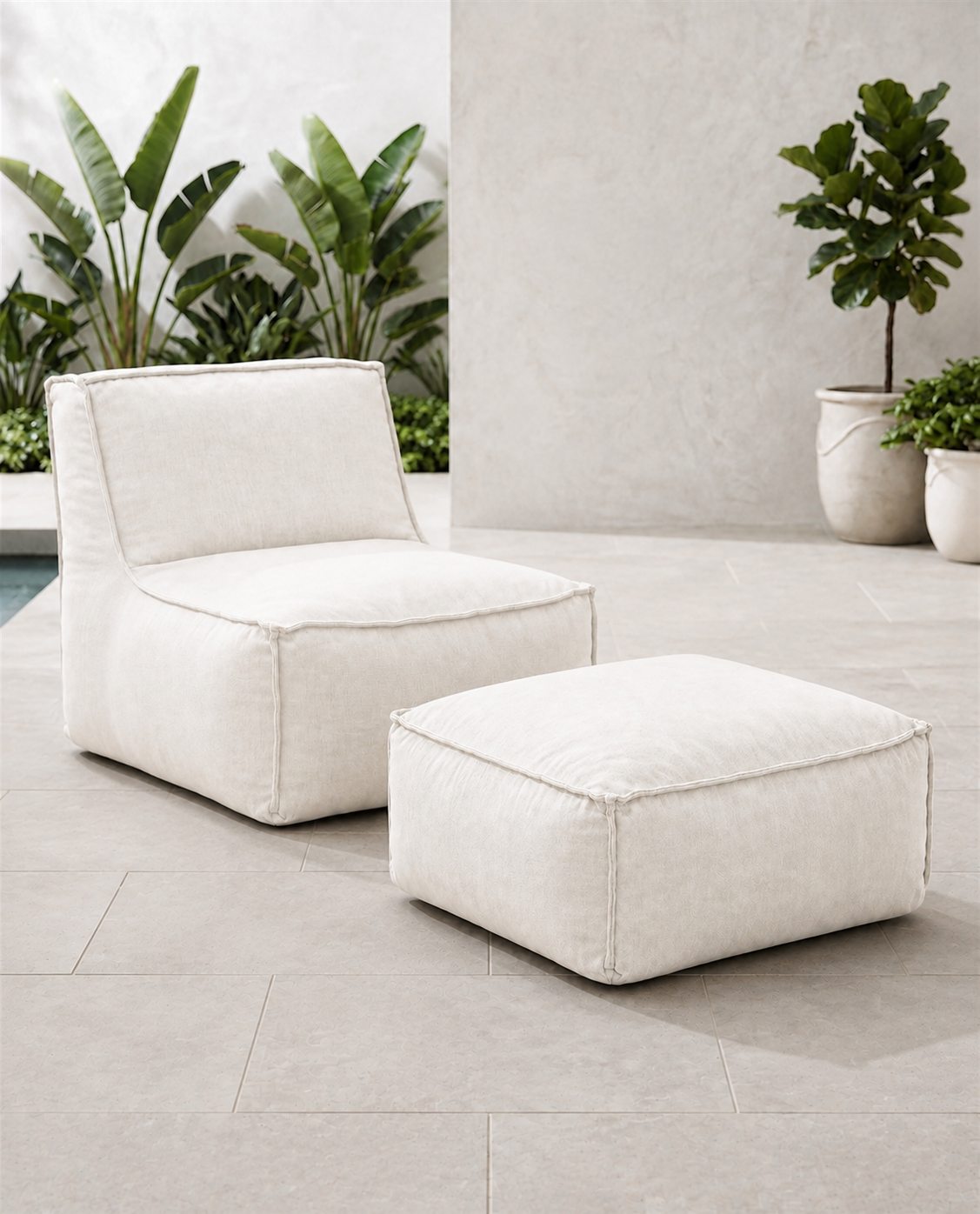 Cove outdoor lounge chair and matching ottoman in Nurture White Sunbrella fabric