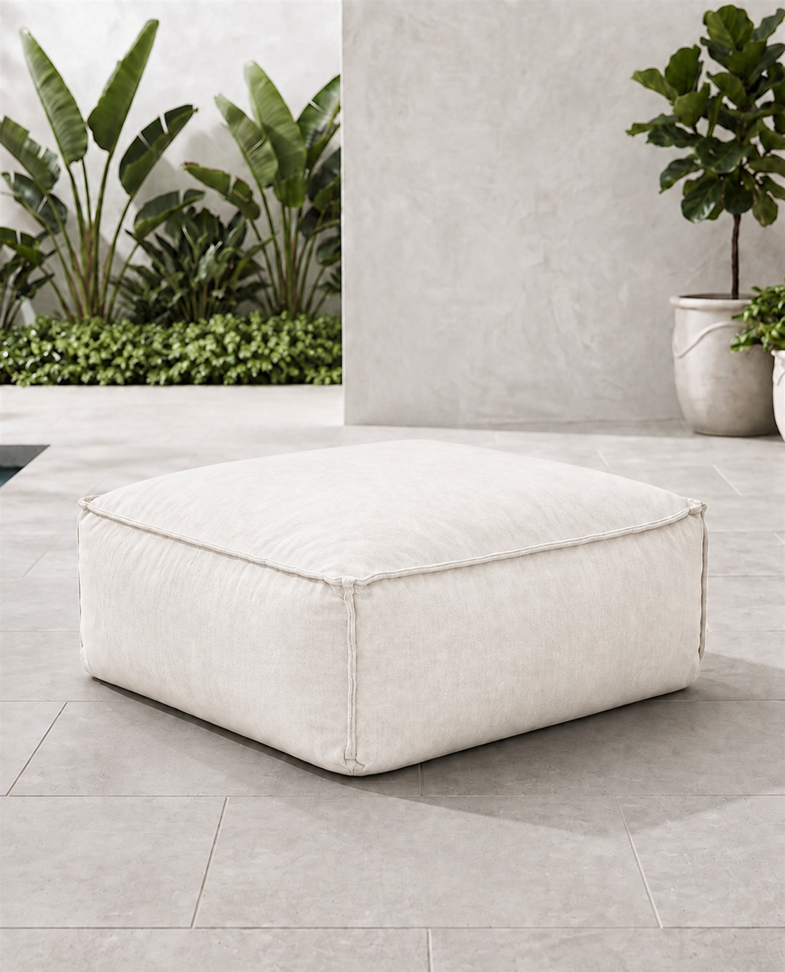 Cove outdoor ottoman in Nurture White Sunbrella fabric