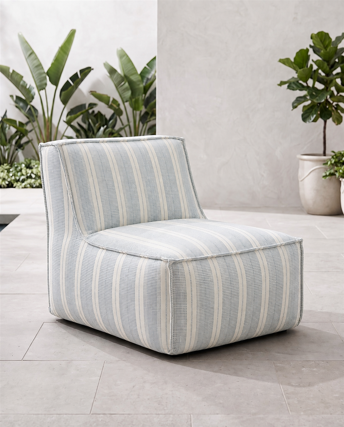 Cove outdoor lounge chair in blue and ivory Dobby Stripe Sunbrella fabric